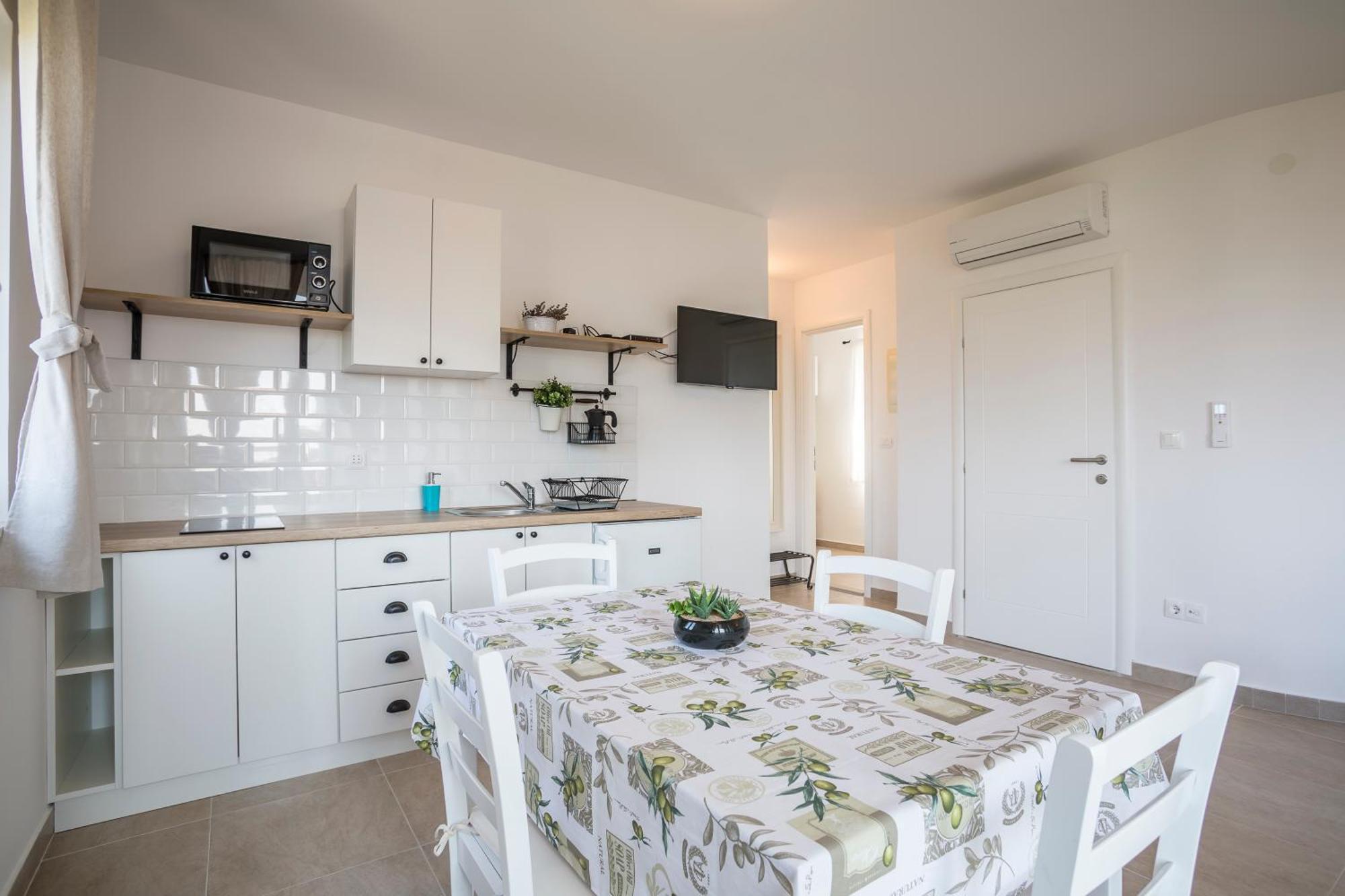 Apartmani Mariela Maslinica Habitación foto